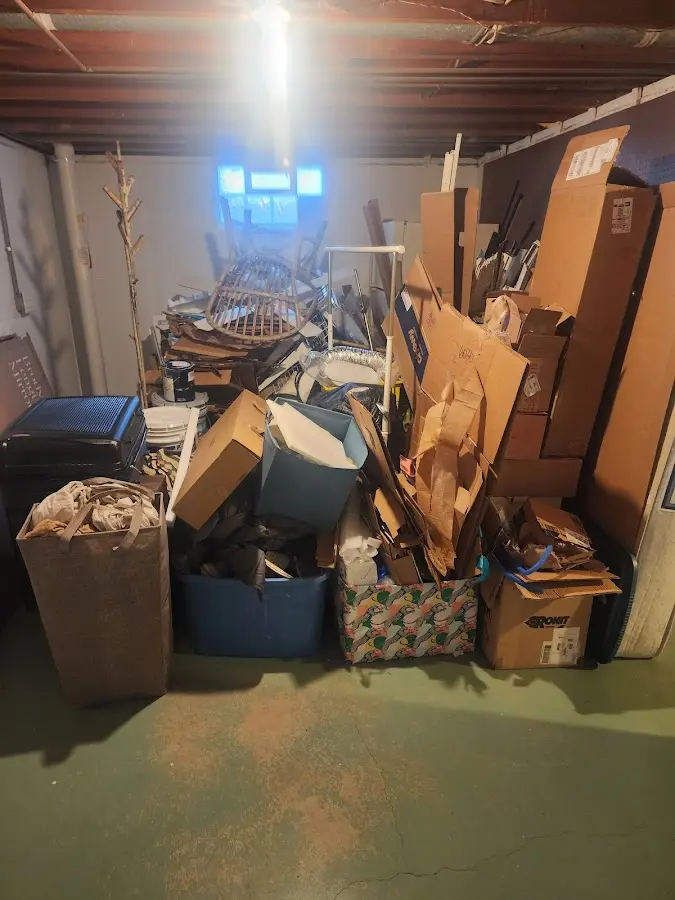 Roll-off dumpster container at job site for Construction Dumpster Rental in Lake Shore